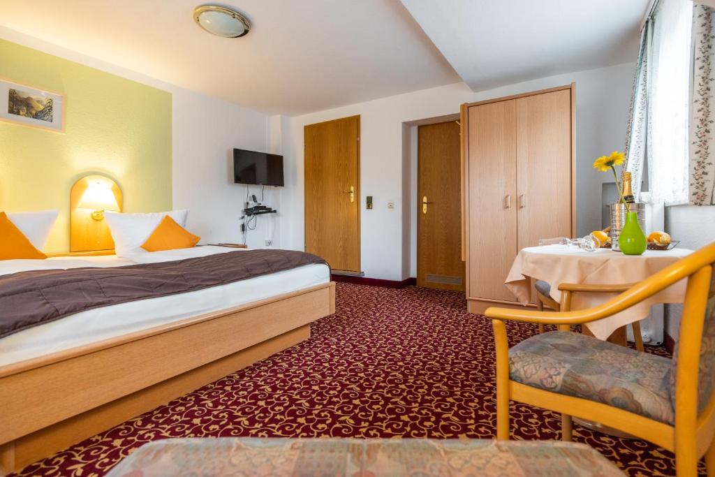Postel nebo postele na pokoji v ubytování Pension & Café Abendröte