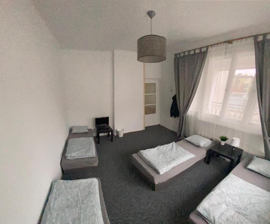 Postel nebo postele na pokoji v ubytování Hostel Czecha