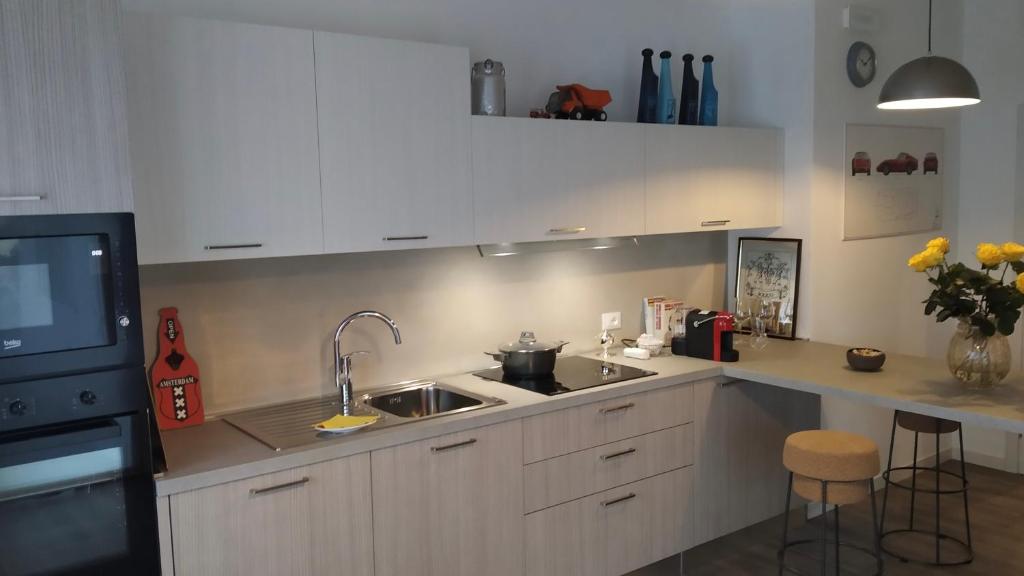 Kuchyň nebo kuchyňský kout v ubytování Garage con camere