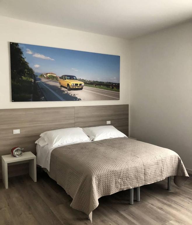 Postel nebo postele na pokoji v ubytování Garage con camere