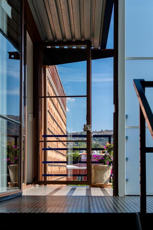 Balkón nebo terasa v ubytování Kubo Hotel