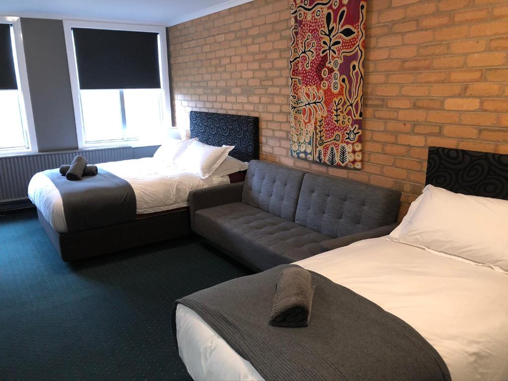 Кровать или кровати в номере Attunga Alpine Lodge & Apartments