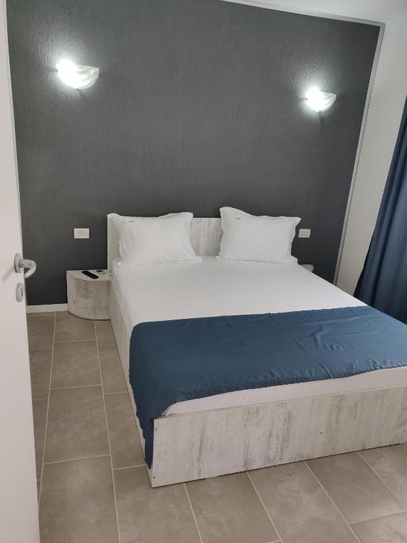 Postel nebo postele na pokoji v ubytování ENKI