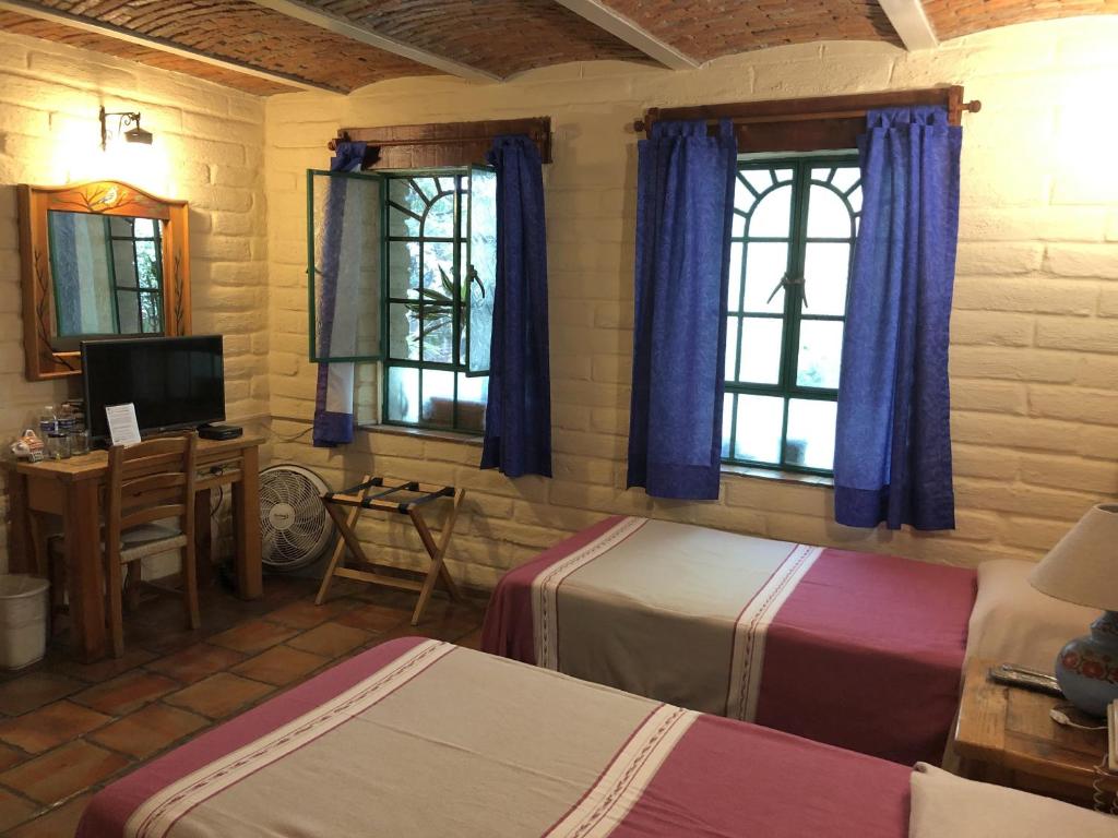 TV a/nebo společenská místnost v ubytování Casa del Retoño