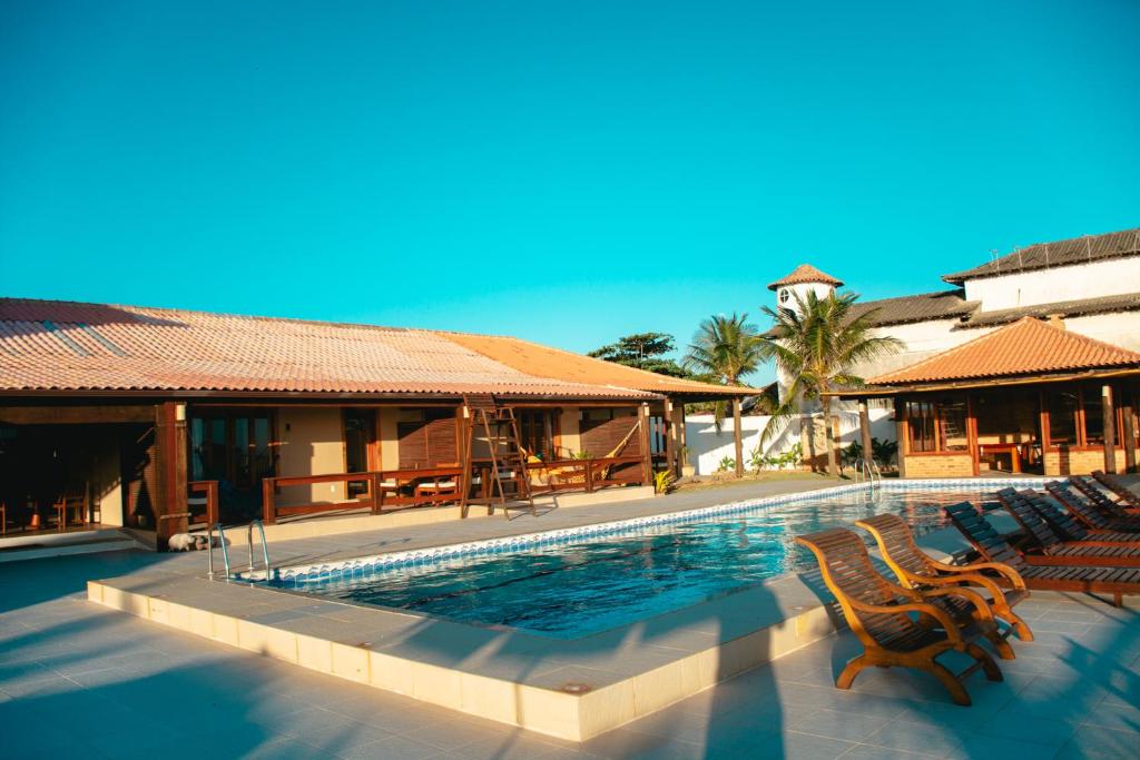 Bazén v ubytovaní Castelhana Praia Hotel - Itauna Saquarema alebo v jeho blízkosti
