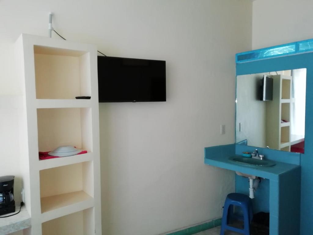 TV a/nebo společenská místnost v ubytování Posada de Vick