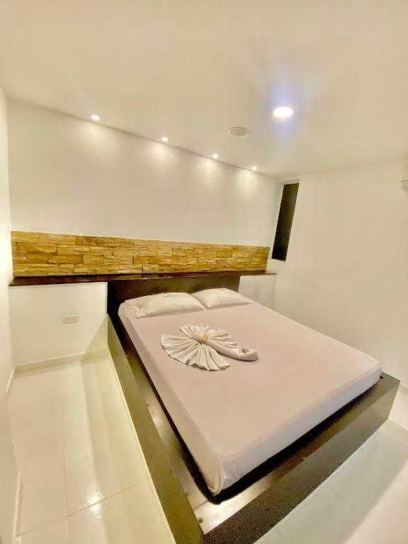 Postel nebo postele na pokoji v ubytování Hotel Paradisus