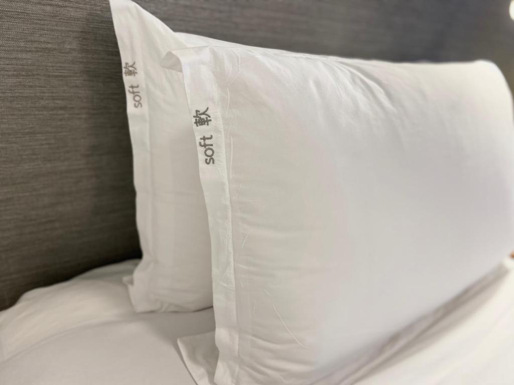 Postel nebo postele na pokoji v ubytování Holiday Inn Express Hong Kong Causeway Bay by IHG