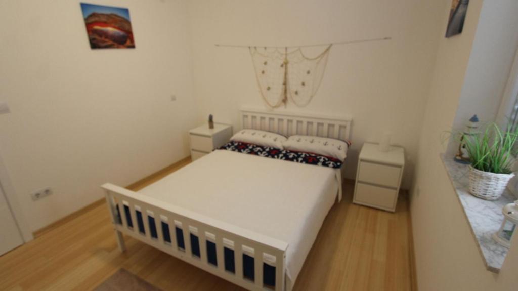 Postel nebo postele na pokoji v ubytování Apartment Lily