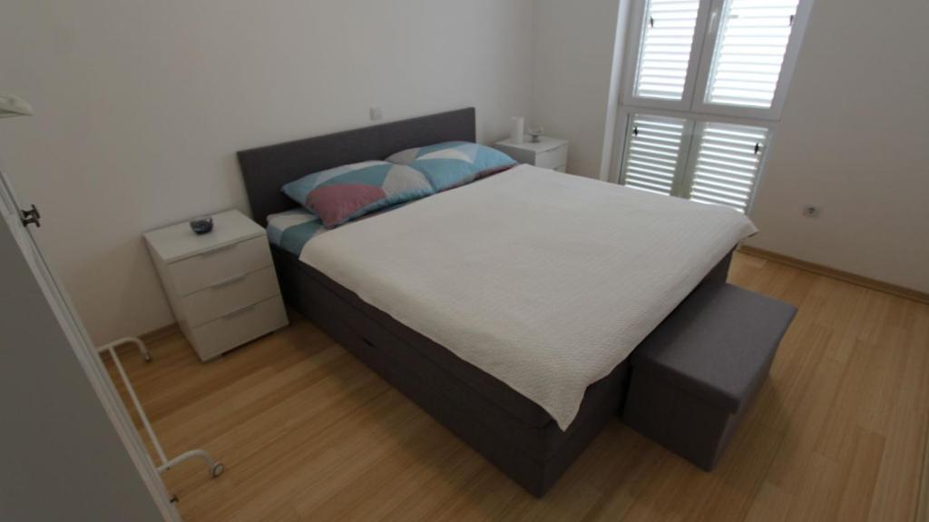 Postel nebo postele na pokoji v ubytování Apartment Lily