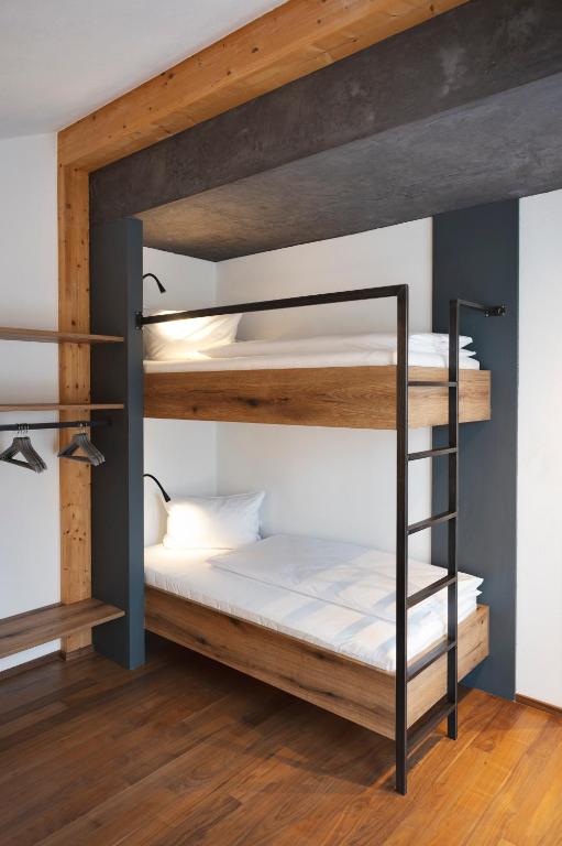 Postel nebo postele na pokoji v ubytování Ferienhaus zum Stubaier Gletscher - Wiesen