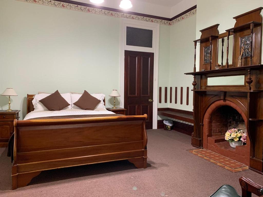 Postel nebo postele na pokoji v ubytování Orana House