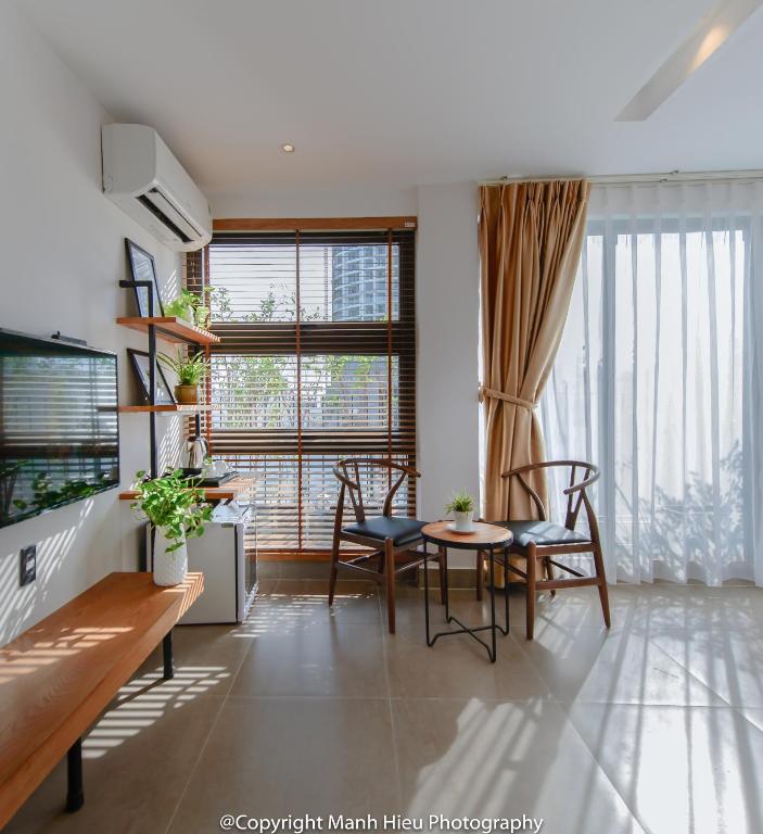 TV a/nebo společenská místnost v ubytování Mojzo Inn Boutique Hotel