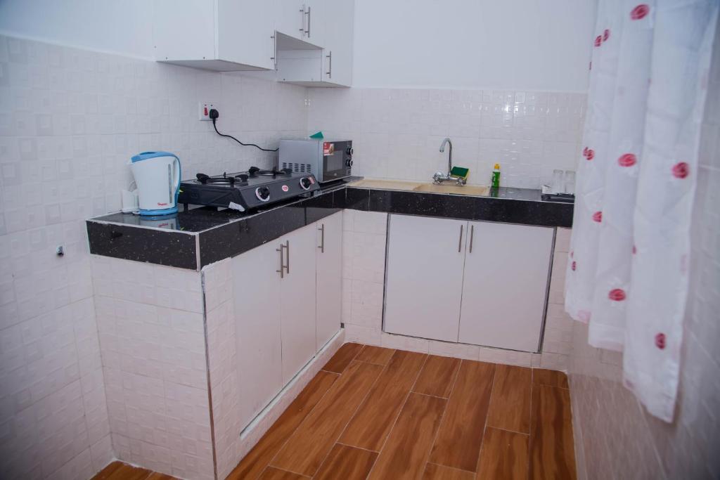 Kuchyň nebo kuchyňský kout v ubytování Sheratton Beach Villagio