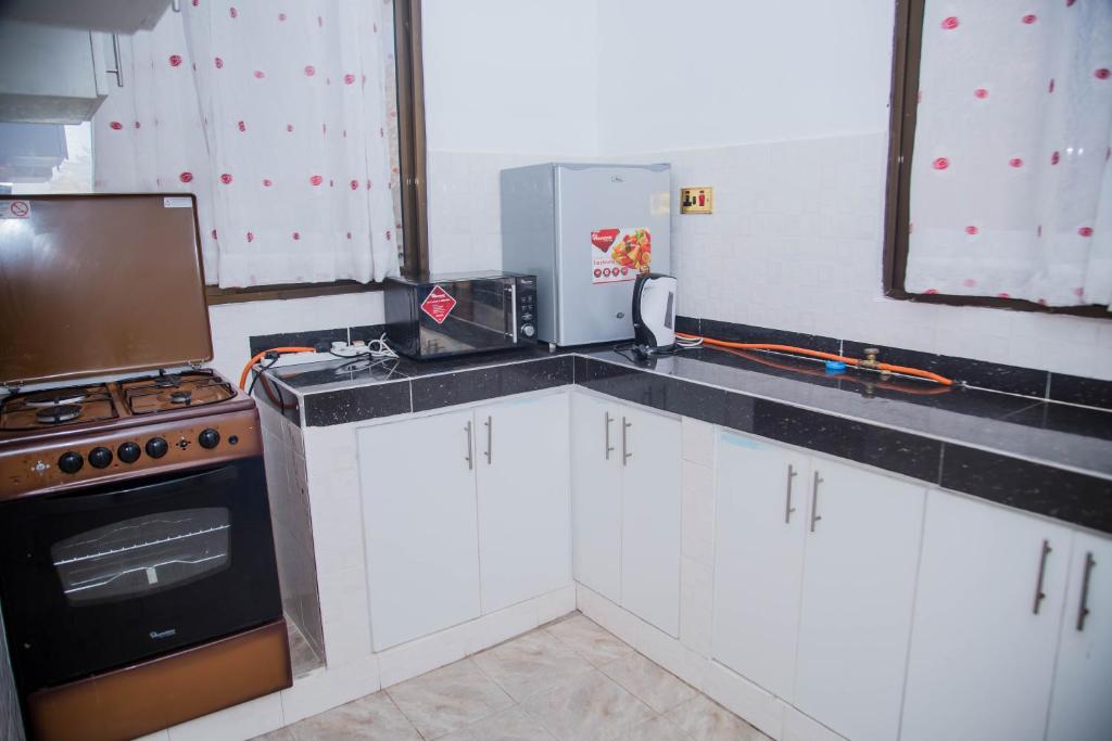 Kuchyň nebo kuchyňský kout v ubytování Sheratton Beach Villagio