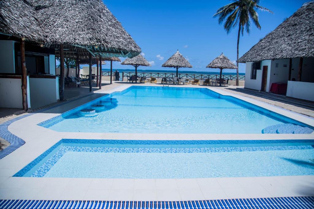 Bazén v ubytování Sheratton Beach Villagio nebo v jeho okolí