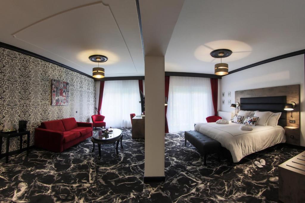 Postel nebo postele na pokoji v ubytování Hôtel du Barry Resort & Spa