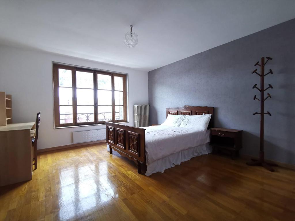 Postel nebo postele na pokoji v ubytování Appartements au bord de la rivière