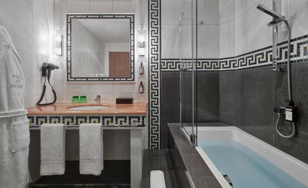 Kúpeľňa v ubytovaní Hotel Schwarzer Adler Innsbruck