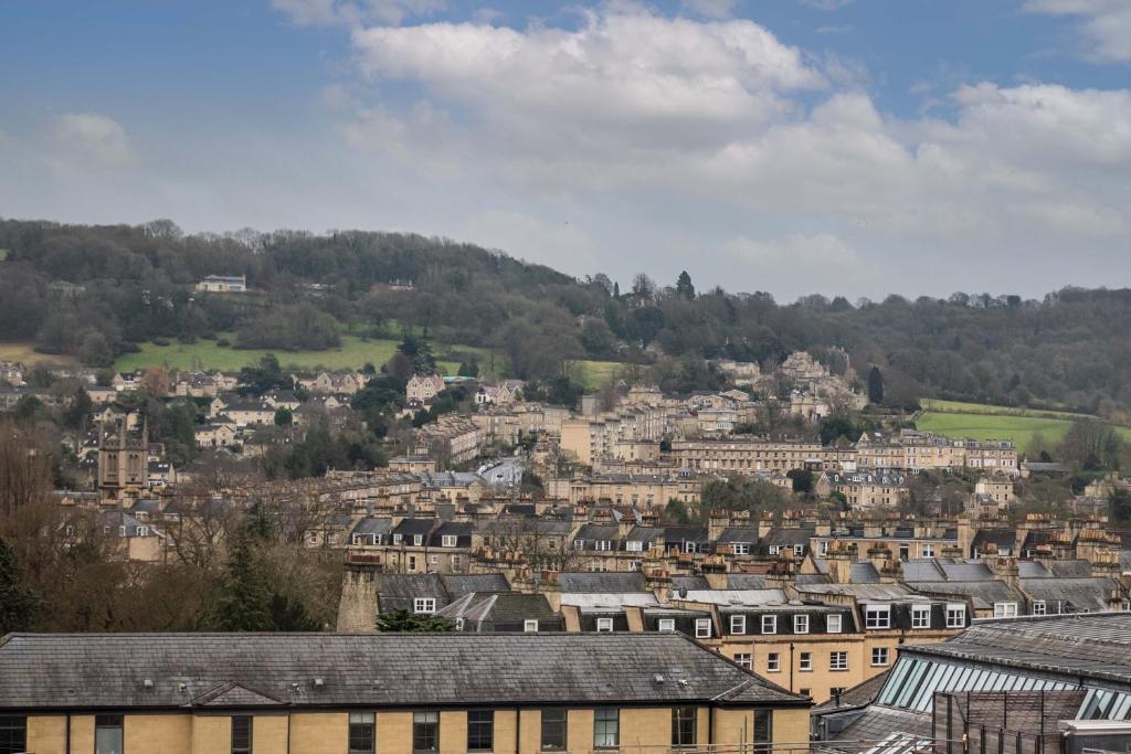 a cityscape of a town with buildings and trees at No 1 The Paragon in Bath