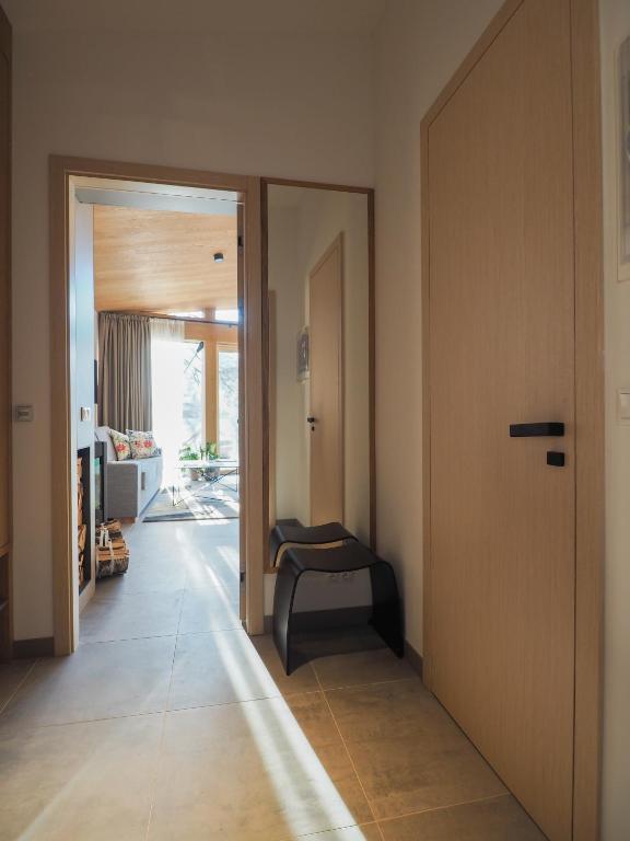 Postel nebo postele na pokoji v ubytování CHALEYOTT Mountain Apartments