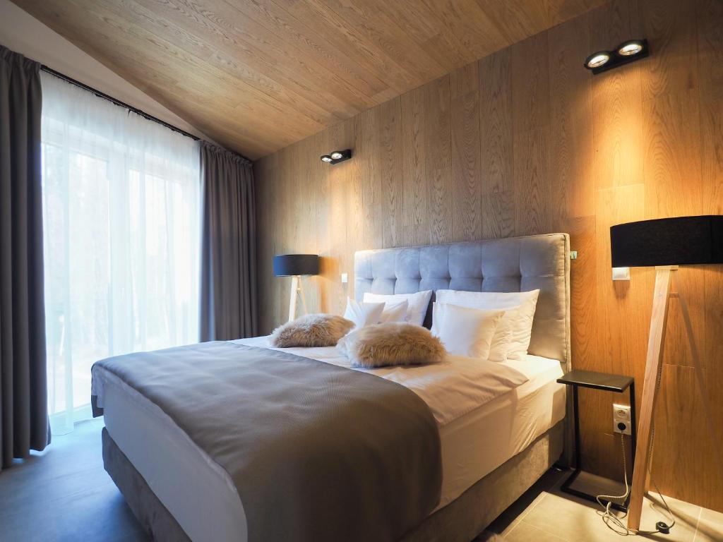 Postel nebo postele na pokoji v ubytování CHALEYOTT Mountain Apartments