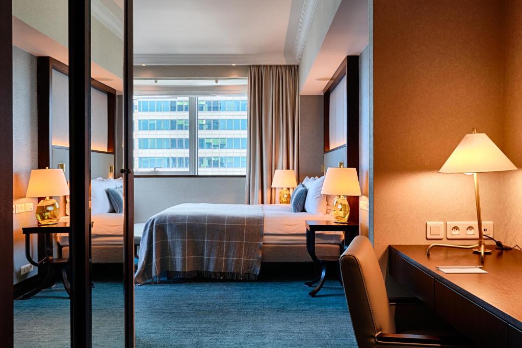 Postel nebo postele na pokoji v ubytování InterContinental Warszawa by IHG