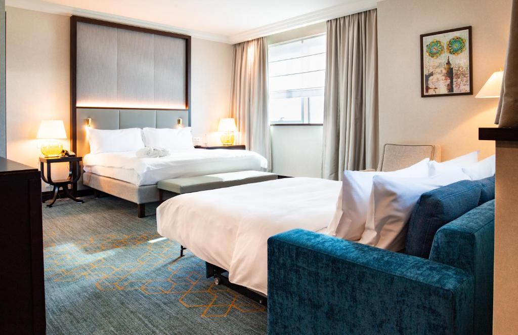 Postel nebo postele na pokoji v ubytování InterContinental Warszawa by IHG