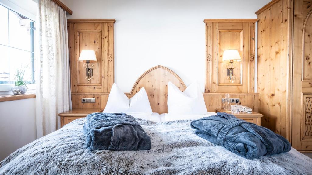 Кровать или кровати в номере Anthony´s Alpin Hotel Garni