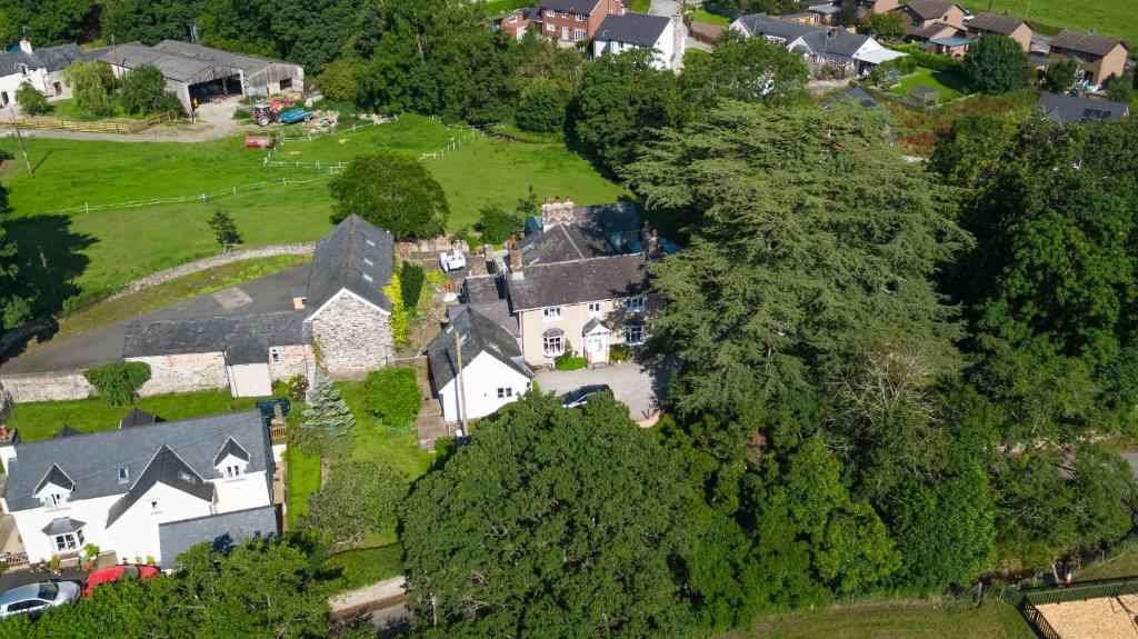 an aerial view of a house in a village at The Old Rectory Bed and Breakfast in Ruthin