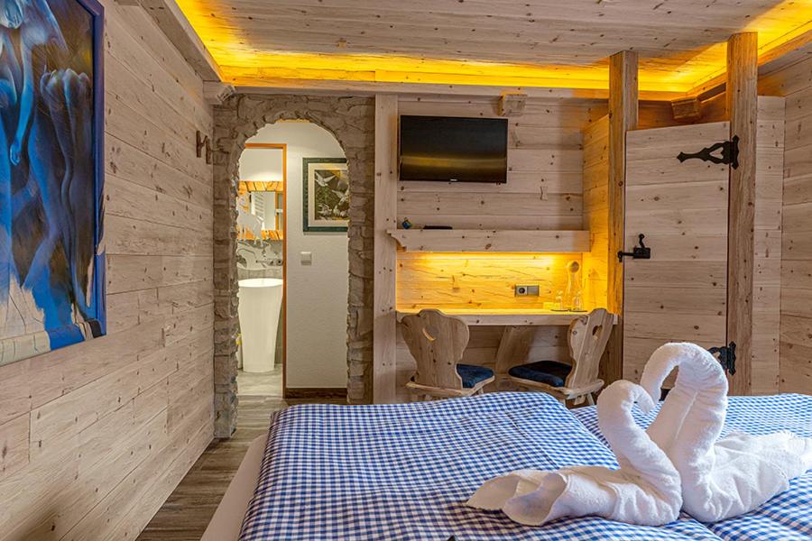 Postel nebo postele na pokoji v ubytování Almhotel Grünsteinblick