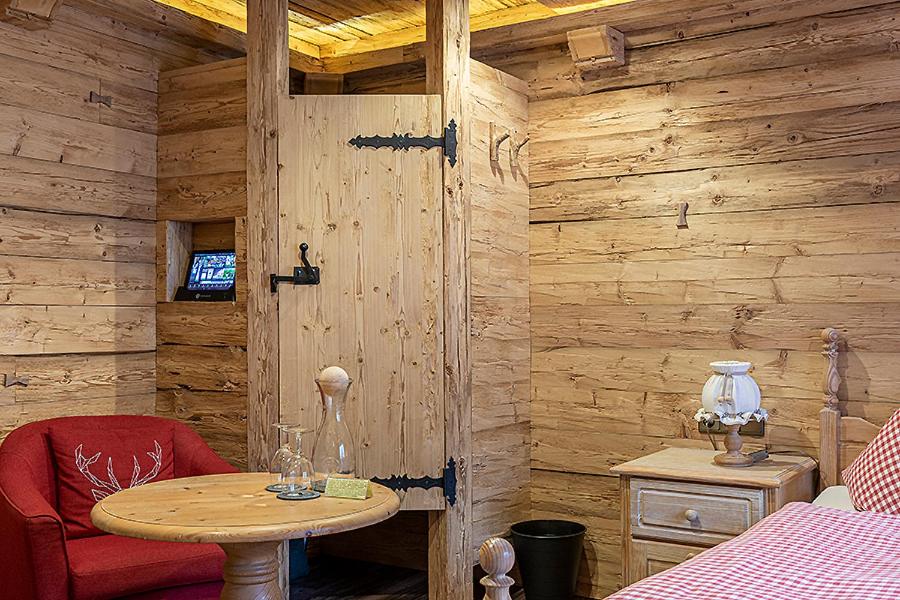TV a/nebo společenská místnost v ubytování Almhotel Grünsteinblick