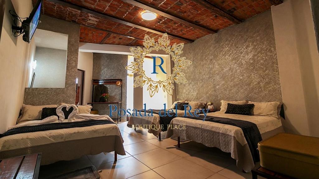 Postel nebo postele na pokoji v ubytování Casa De Rey