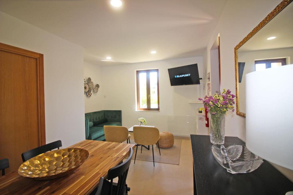 TV a/nebo společenská místnost v ubytování Casa da Terrada by Gerês Casas