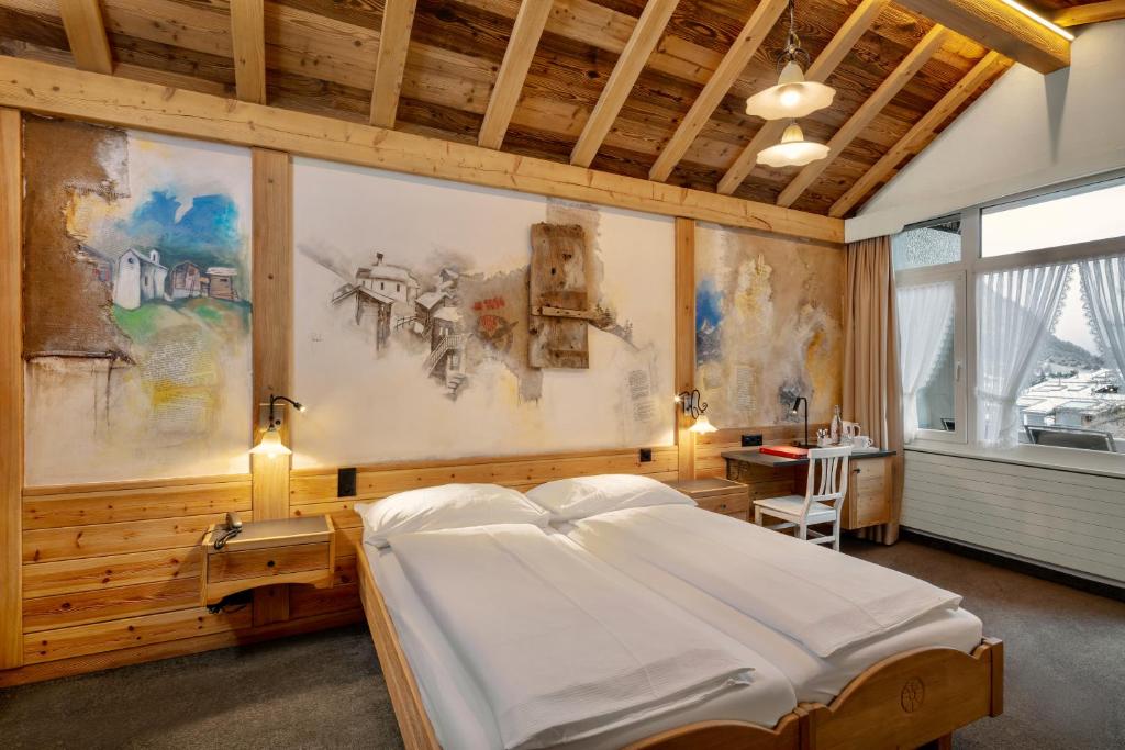 Postel nebo postele na pokoji v ubytování Hotel Antika