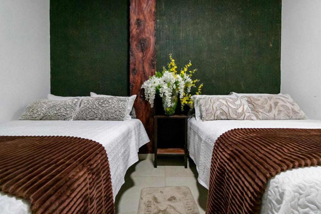 Postel nebo postele na pokoji v ubytování Casa De Rey