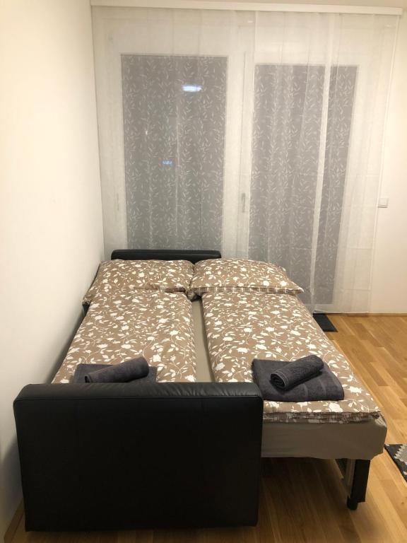 Posteľ alebo postele v izbe v ubytovaní Neubau Wohnung Stadlau