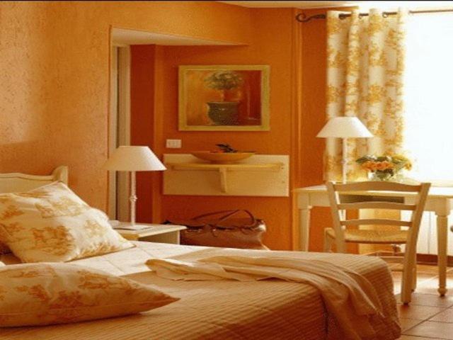 Cama o camas de una habitación en Hôtel Bonaparte