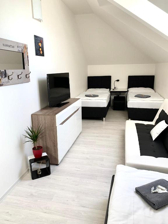 Postel nebo postele na pokoji v ubytování Hotel Stará Pošta