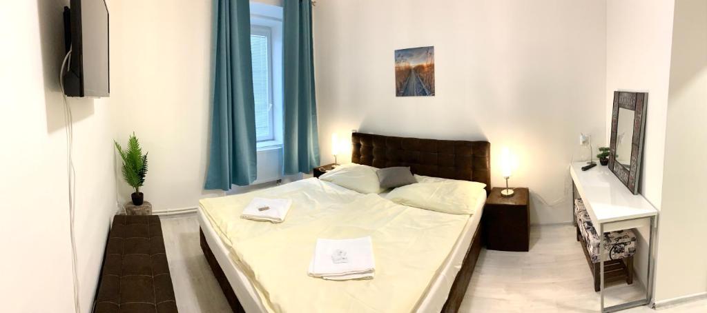 Postel nebo postele na pokoji v ubytování Hotel Stará Pošta
