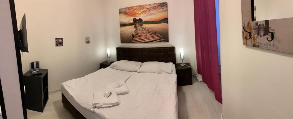 Postel nebo postele na pokoji v ubytování Hotel Stará Pošta