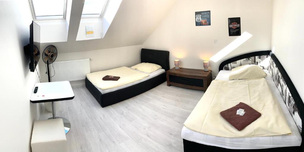 Postel nebo postele na pokoji v ubytování Hotel Stará Pošta