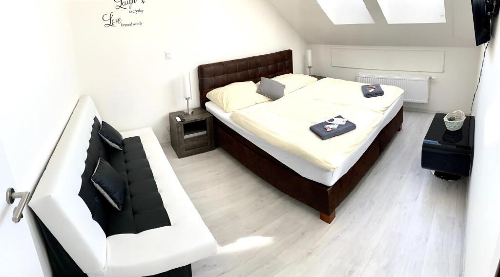 Postel nebo postele na pokoji v ubytování Hotel Stará Pošta