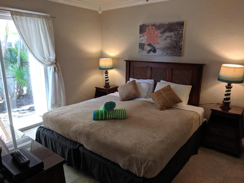Postel nebo postele na pokoji v ubytování Manhattan Tower Apartment Hotel