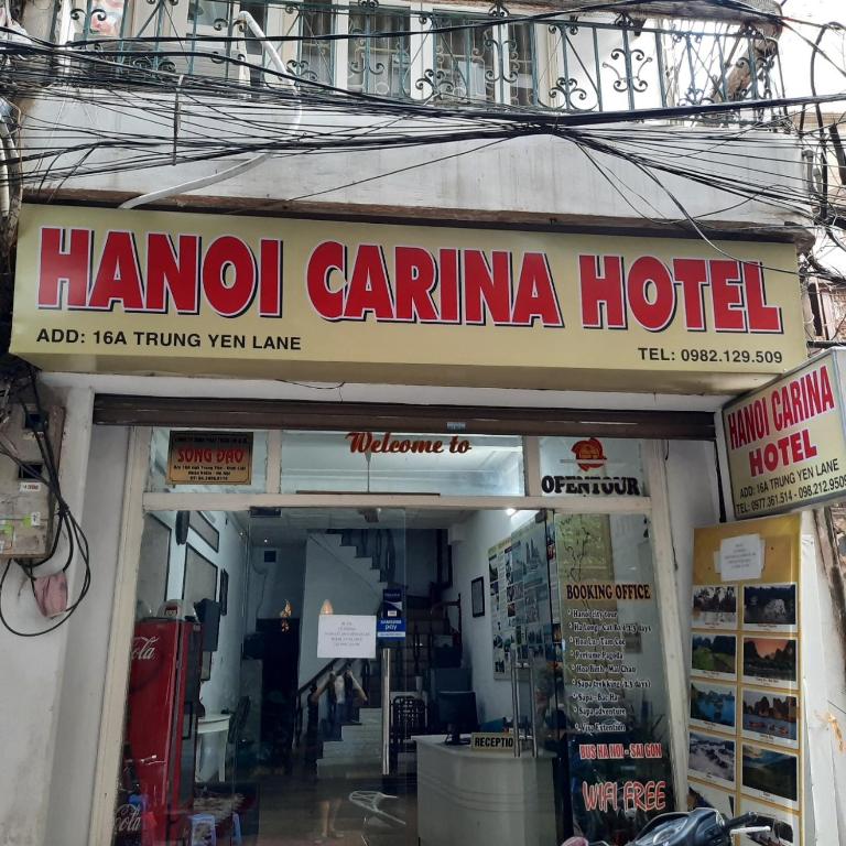 a sign for a hanoi cantina hotel in a building at Hanoi Carina Hotel in Hanoi