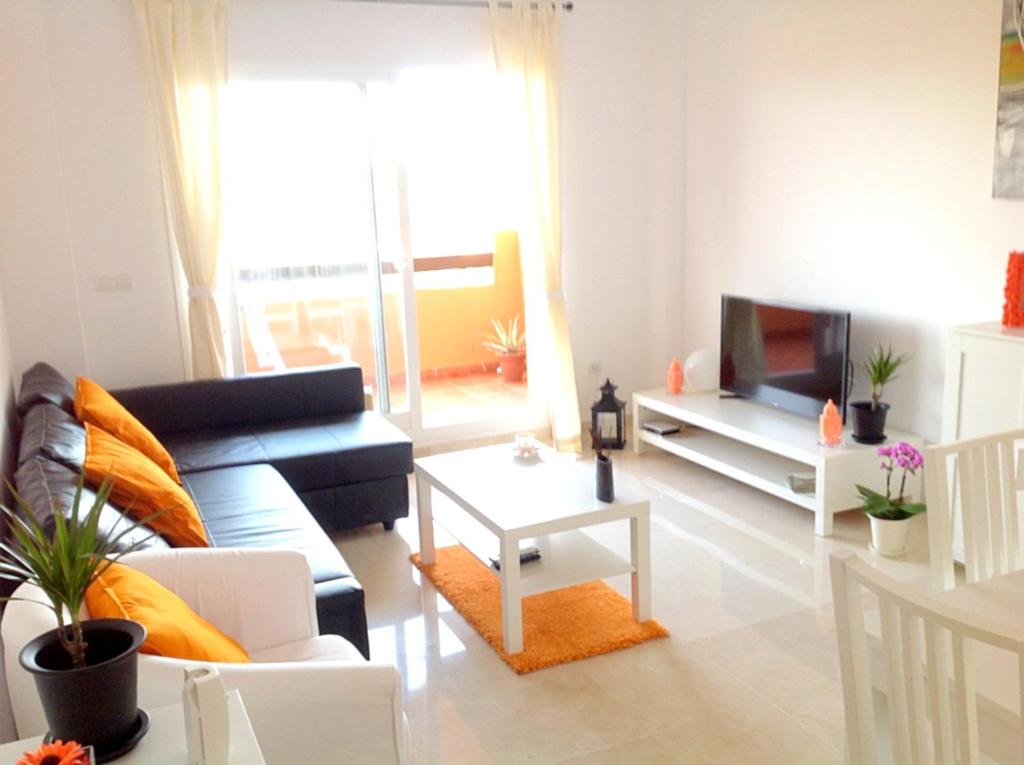 Posedenie v ubytovaní Bright apartment with sea view in Casares, 96 m², pool