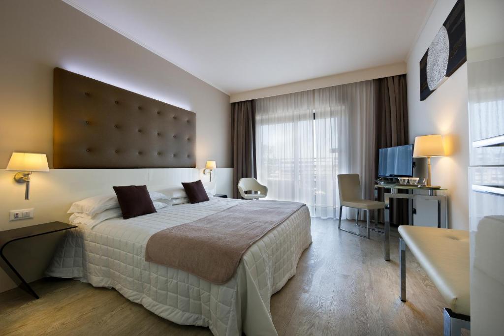 TV a/nebo společenská místnost v ubytování Hotel Desenzano