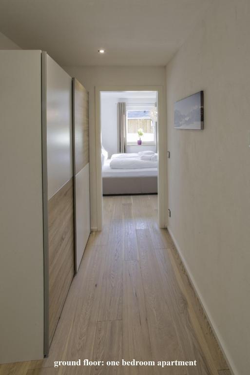 Postel nebo postele na pokoji v ubytování Ferienhaus Alpenjuwel