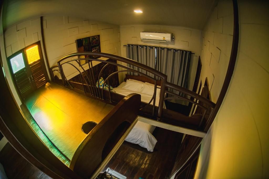 Postel nebo postele na pokoji v ubytování Suankaew​ art​ hostel​