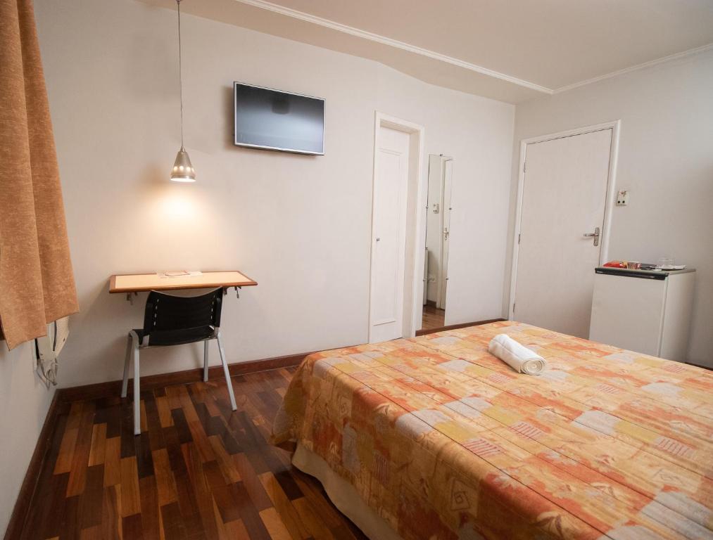 Postel nebo postele na pokoji v ubytování Hotel Bramig